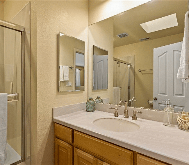 Full bathroom with lovely embellishments, shower & bath-tub