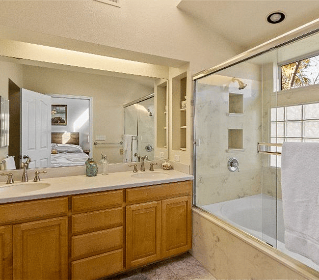 Full bathroom with lovely embellishments, shower & bath-tub