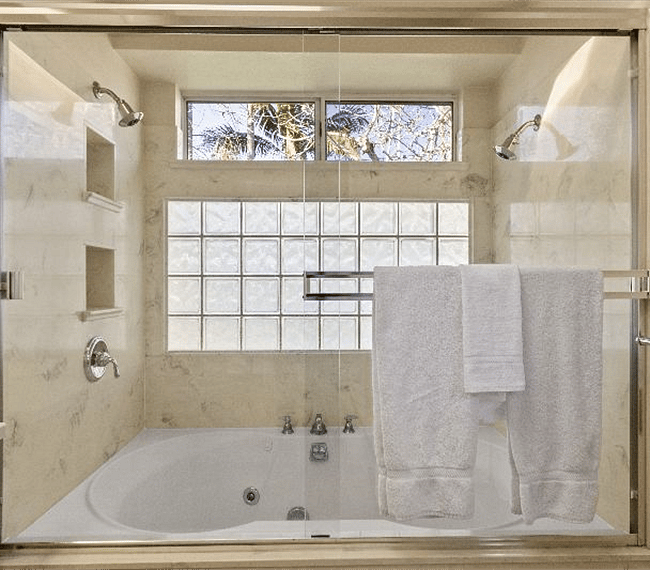 Full bathroom with lovely embellishments, shower & bath-tub
