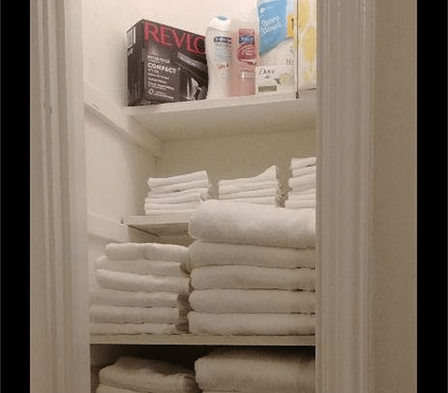 linen closet where you will find your bathroom essentials
