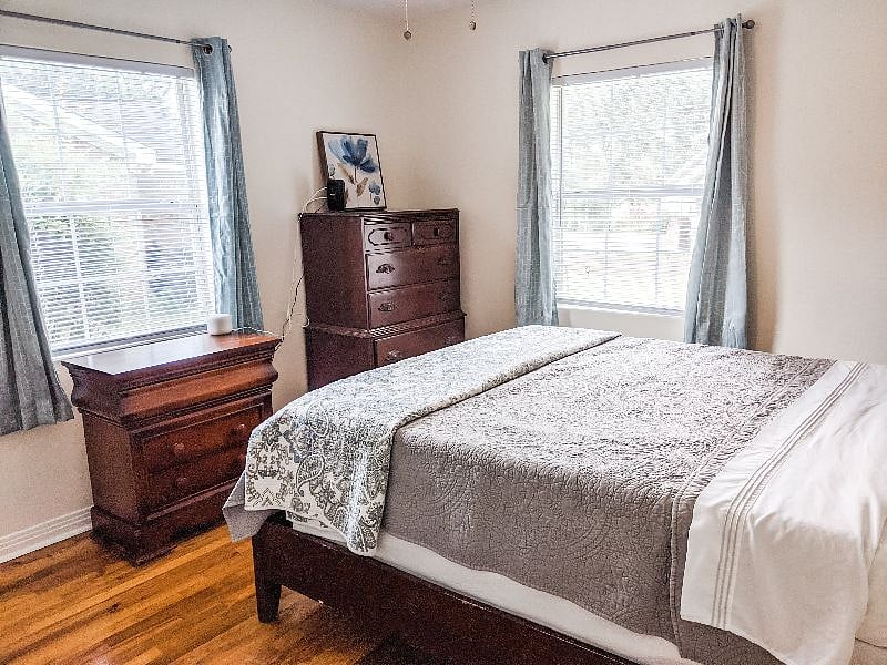 Two dressers (and the wifi modem & router!) in the back bedroom.