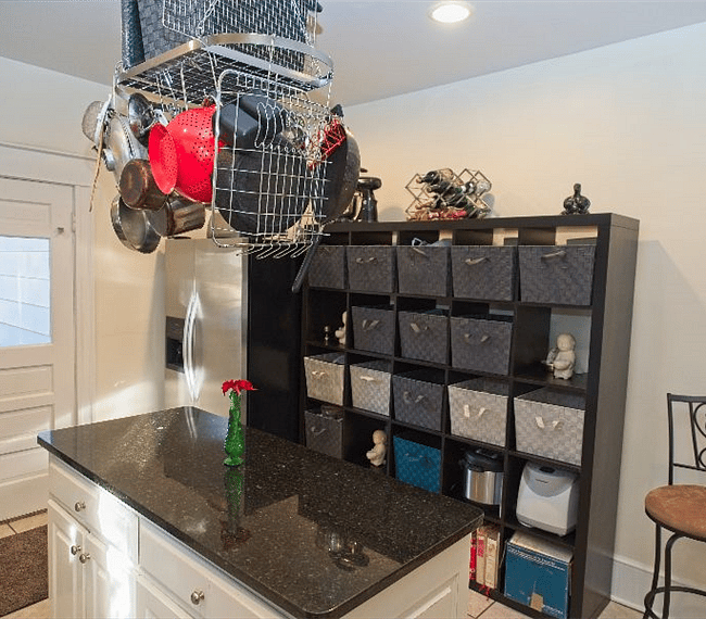 Kitchen storage -- house has three full-sized refrigerators!