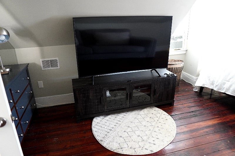 65 inch smart tv in masterbed room