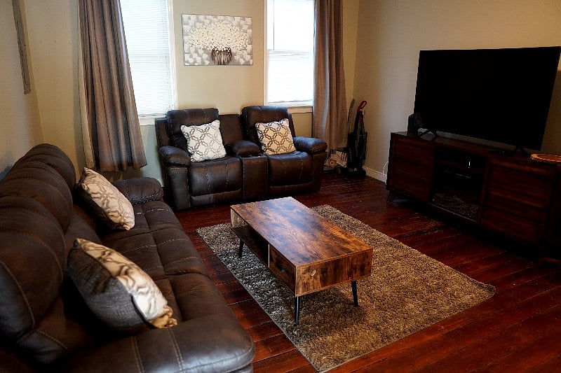 Reclining luxurious seating. 65 inch Smart tv and cozy fire place with real heat in the entertainment console.