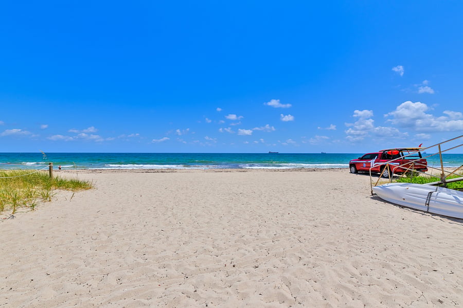 ONE MILE FROM THIS BEACH...