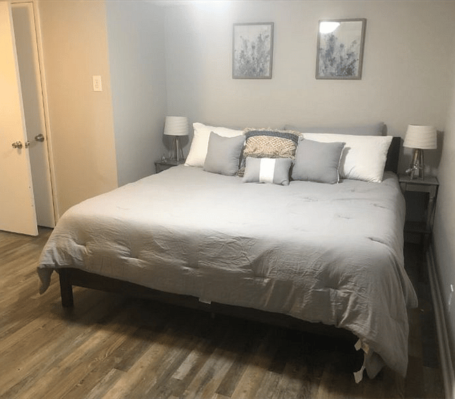 Masters bedroom with king sized bed, drawers, wardrobe, mirror & lovely night stands