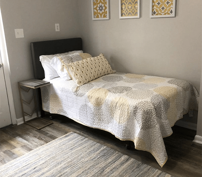 2nd bedroom with comfy twin beds, carpet, drawer, wardrobe & nighstands