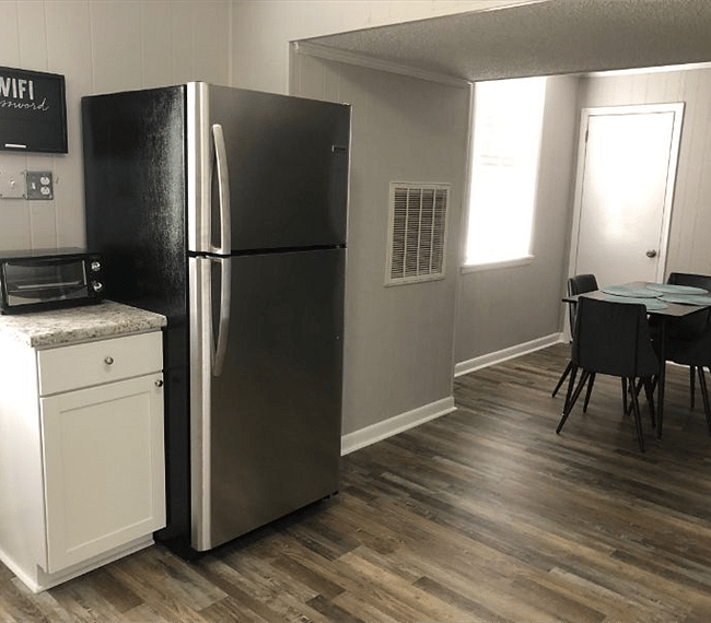 Fully equipped kitchen with all essential implements such as dish washer, stove & spacious fridge. Right next to the kitchen youll find the dining area