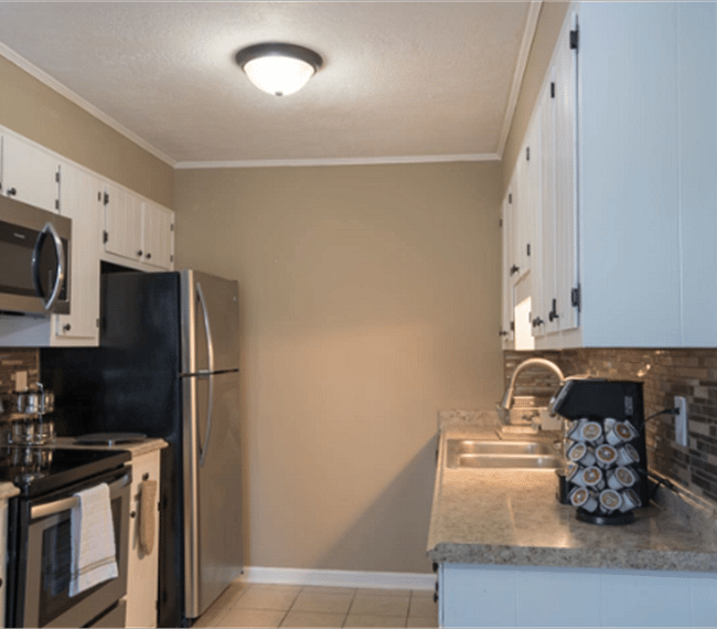 Fully equipped kitchen with all essential implements