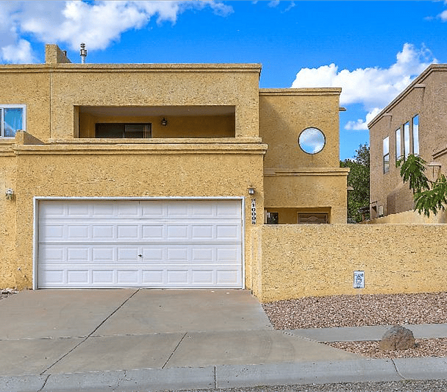 Outside view of the house & Garage