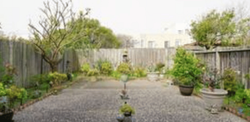 Spacious patio with sitting area and griller