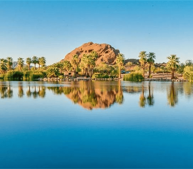 Walk 1 mile or drive 3 min to enjoy desert scenery and plenty of hiking trails at Papago Park. 