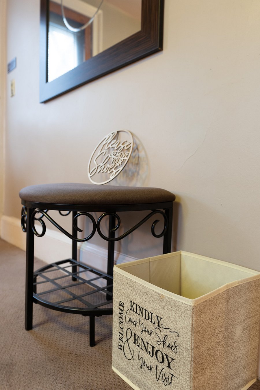 convenient bench for removing outdoor shoes and storing slippers