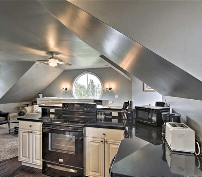 Step upstairs and sink into the sumptuous sofa.