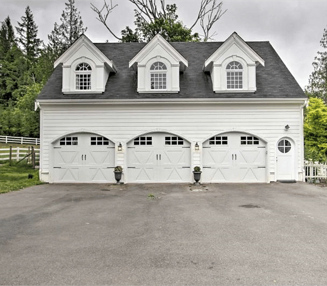 This unit is located on top of a 3-car garage.