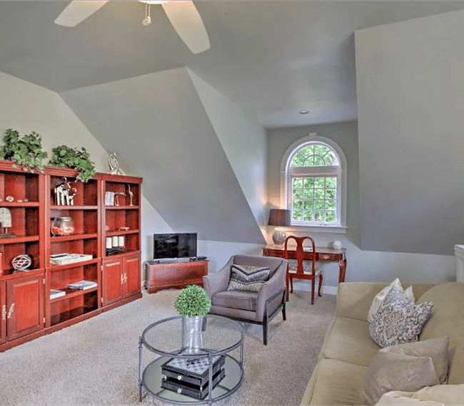 Watch your favorite shows on the flat-screen cable TV in the living room.