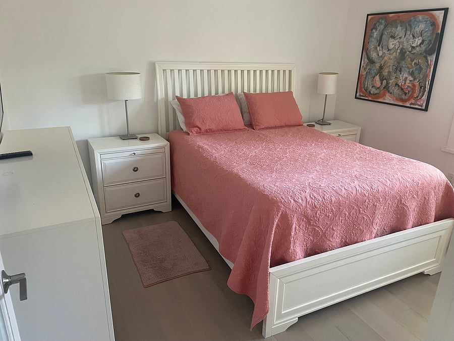 Queen bed with new hybrid mattress.