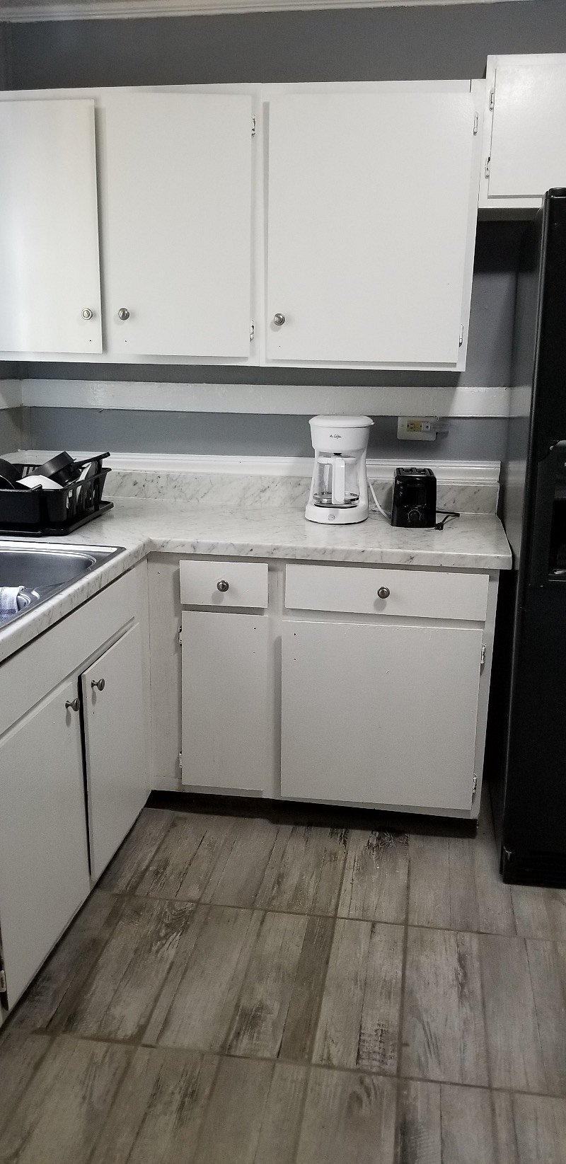 Kitchen - Features pots & pans, dishes & flatware, coffee maker & toaster. Full size refrigerator and an electric stove.