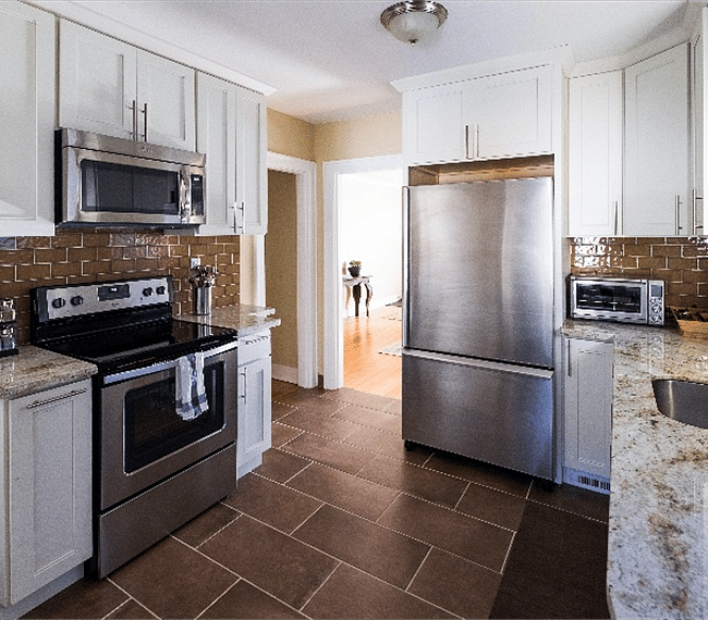 Newly renovated kitchen stainless steel appliances.