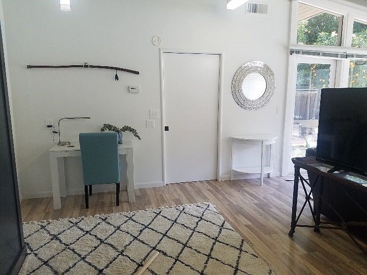 Office space with kitchen door closed for privacy!