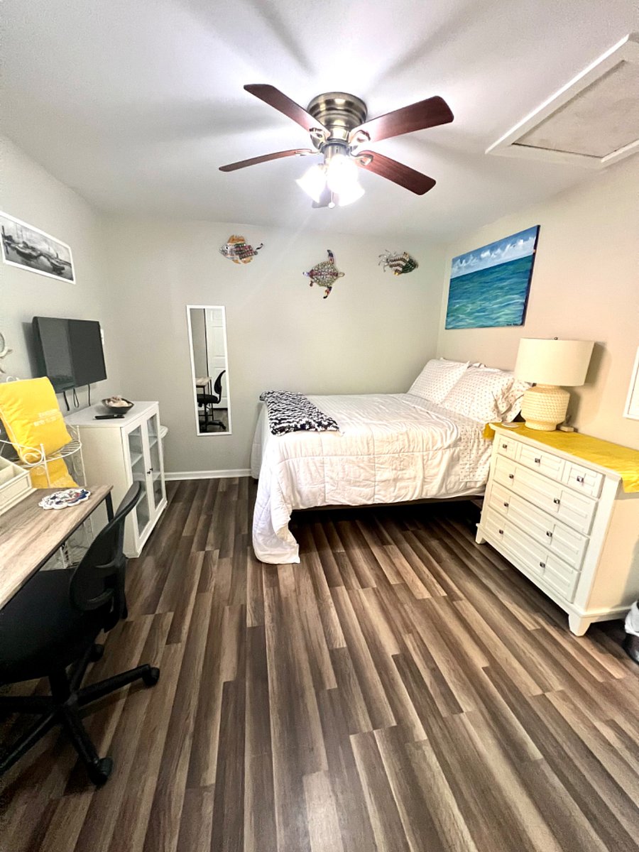 full size bed with working space for laptop
