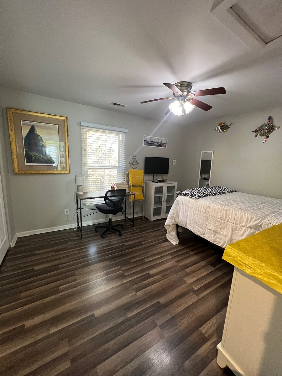 full size bed with working space for laptop