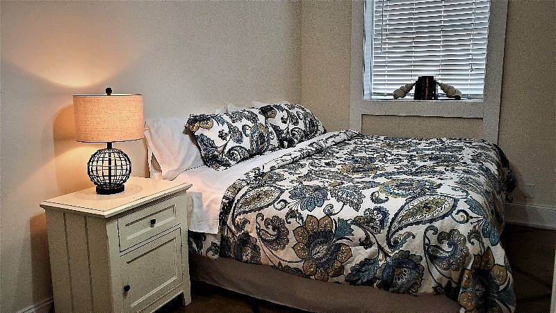 Bedroom 1 with King Bed, en suite bath,  and walk in closet