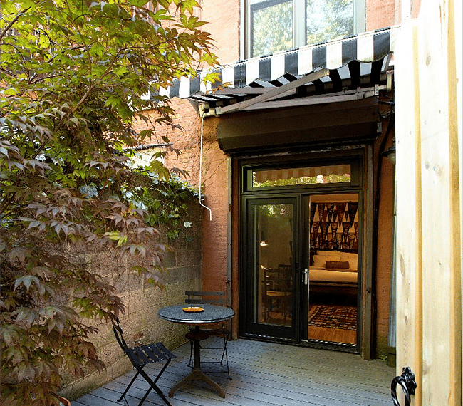 View to bedroom from private outdoor terrace.