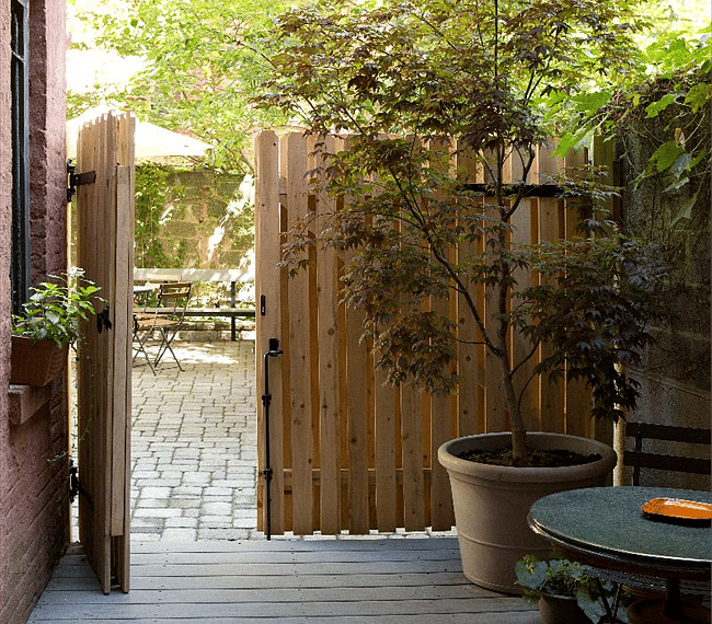 Private terrace opens to large backyard area.