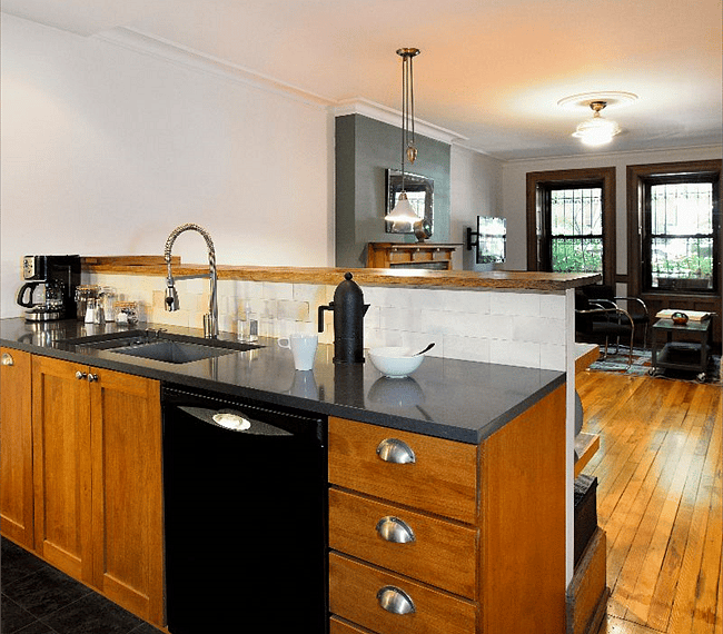 Open kitchen has all amenities.