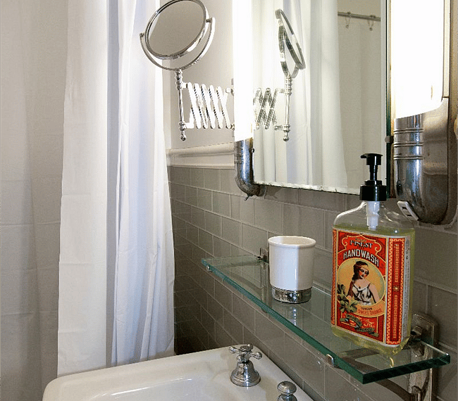Art deco medicine cabinet with plenty of light.