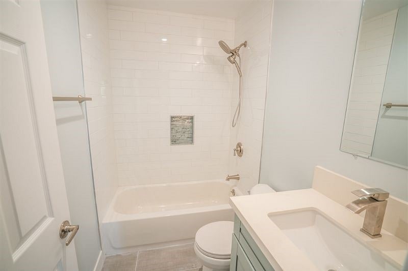 Masters bathroom with bath-tub and shower