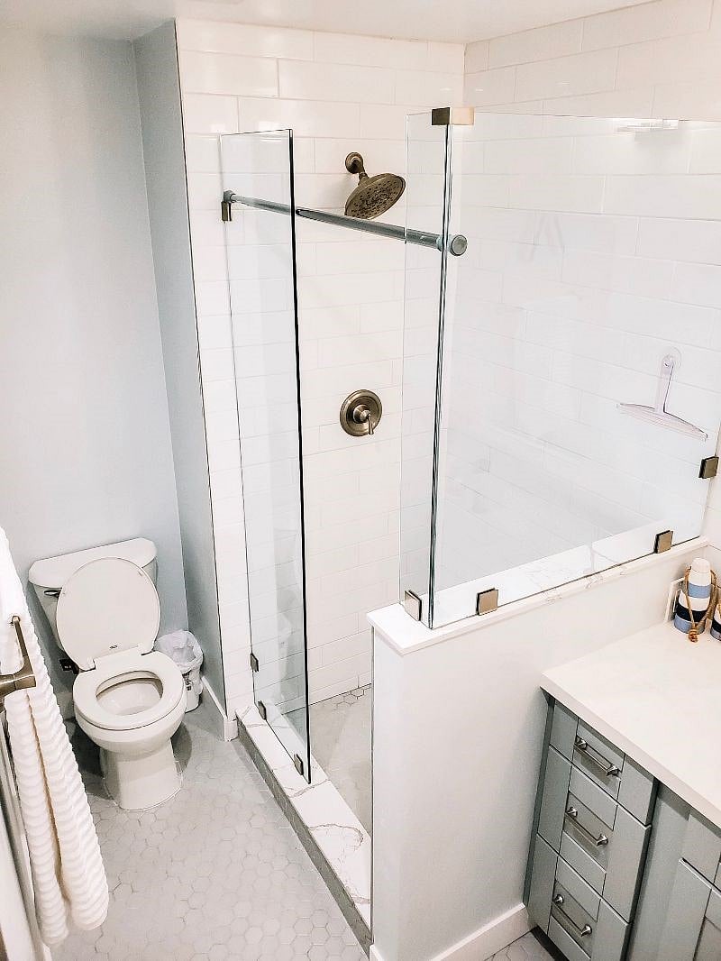 Full bathroom with walk-in shower and vanity sink