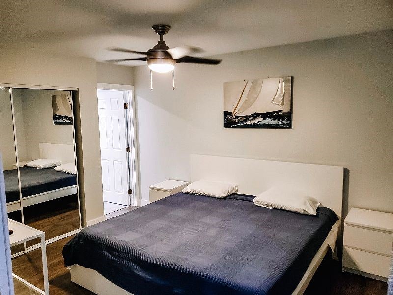 2nd bedroom is bright and spacious with sliding mirror doors to an ample closet