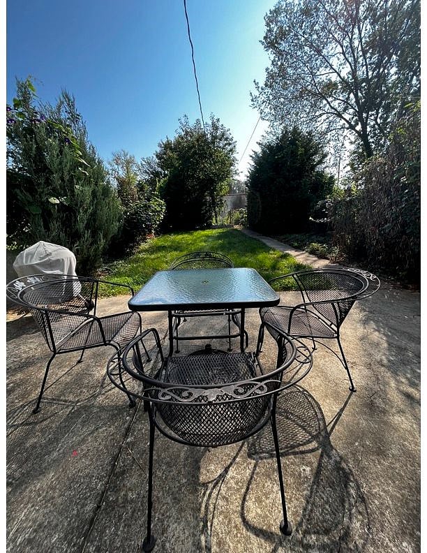 Fenced in backyard with sitting area:
* Please Note: you cannot enter backyard from the back of the house.