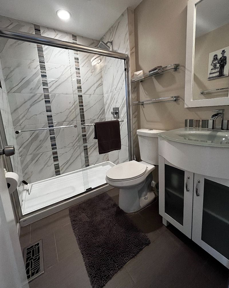 Bathroom with small linen closet