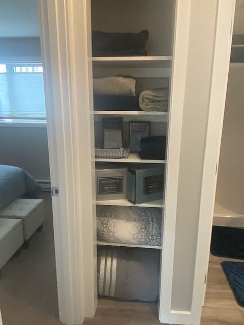 Linen closet in hall is stocked with great towels, sheets and blankets for you