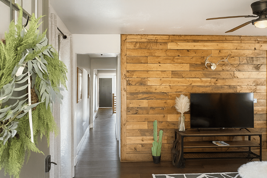 This modern rustic retreat welcomes you with a cozy entertainment nook for your favorite shows or movie nights