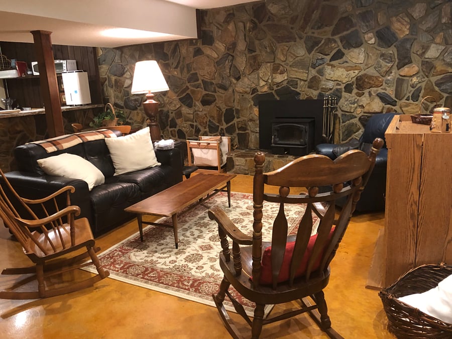 Living Room with view of fireplace with woodstove
