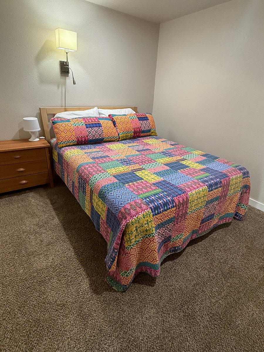Bedroom two offers a queen-size bed with gel-infused ventilated memory foam mattress to help regulate temperature and relieve pressure points for a restful night's sleep