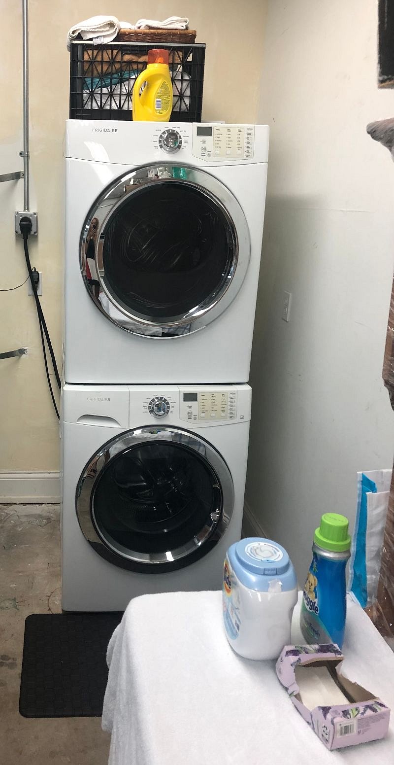 Tenant's private Washer & Dryer in garage below unit 