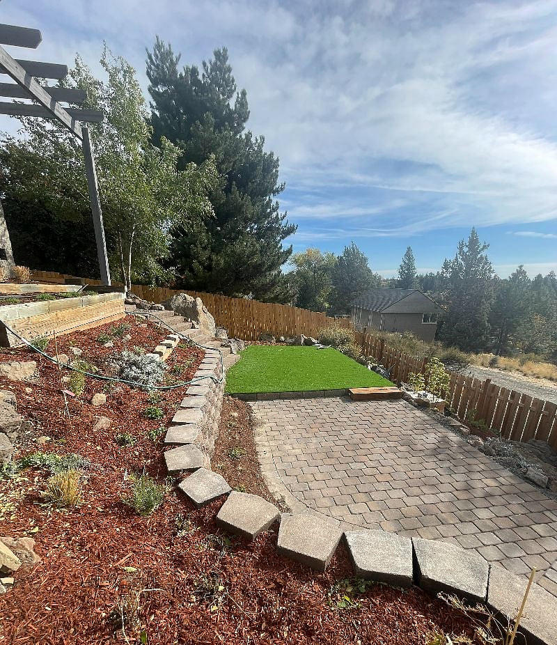 Backyard is fully fenced for the doggos and shared with the owners and their doggos.