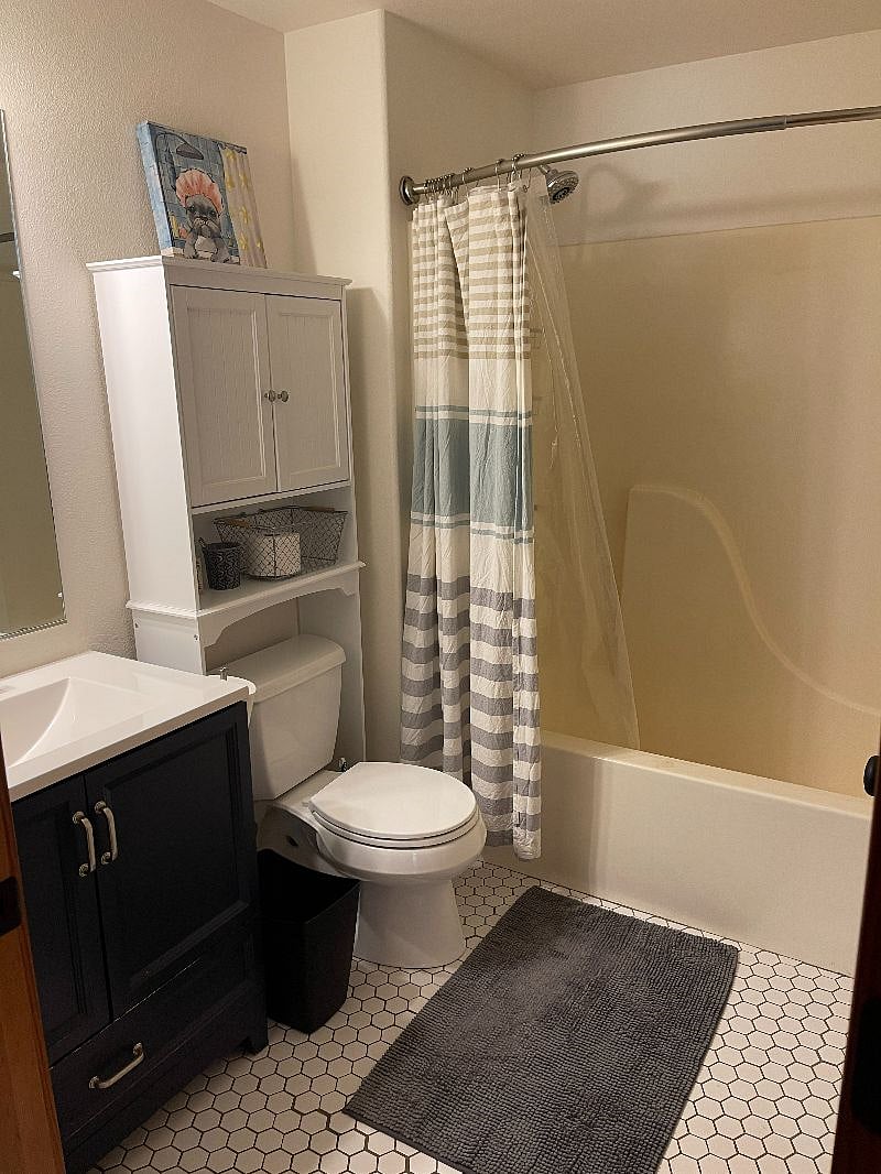 Full bathroom with tub. 