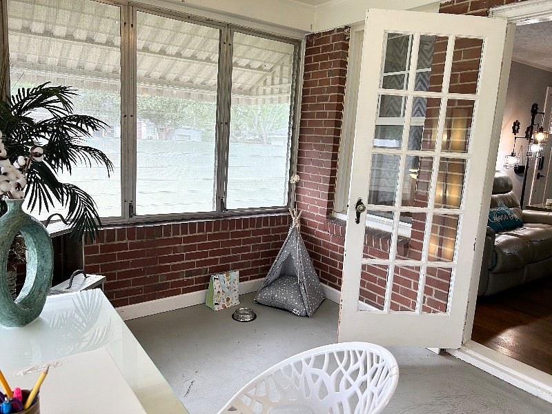 Florida Room now has a Twin Bed and curtains. Can be used as a bedroom/office/play room/game room