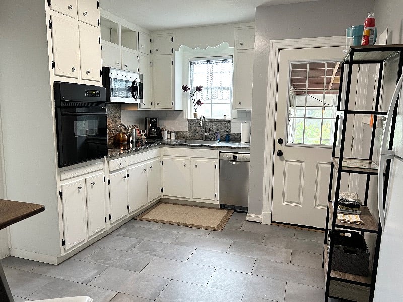 Updated Kitchen, Leather Honed Granite Countertops, Dishwasher, Wall oven, Microwave and Full sized Fridge.