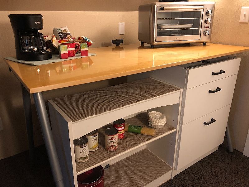 Cooking area. Includes one electric burner and convection oven.