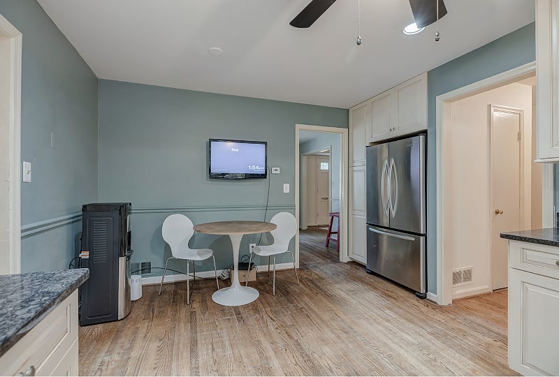 Kitchen view with sitting area and TV