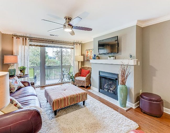 living room looking towards the private patio. For cool days and nights you have your gas fireplace.