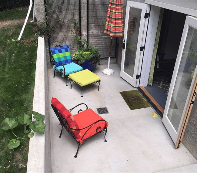 Patio with green space and living wall