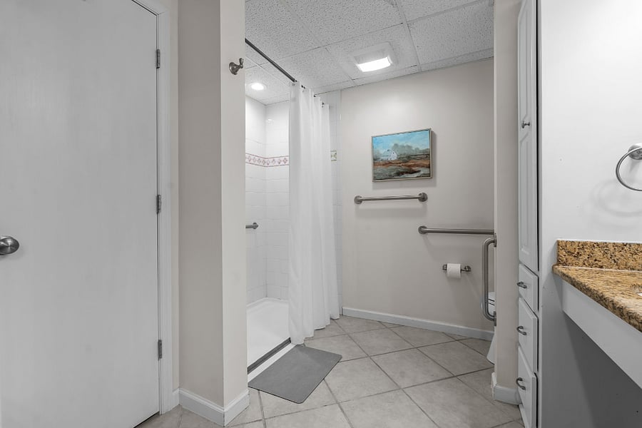 full size walk in shower, heated floors, toilet, sink, plenty of countertop space